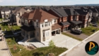 Aerial Drone Shot Of Pool At Back Of House